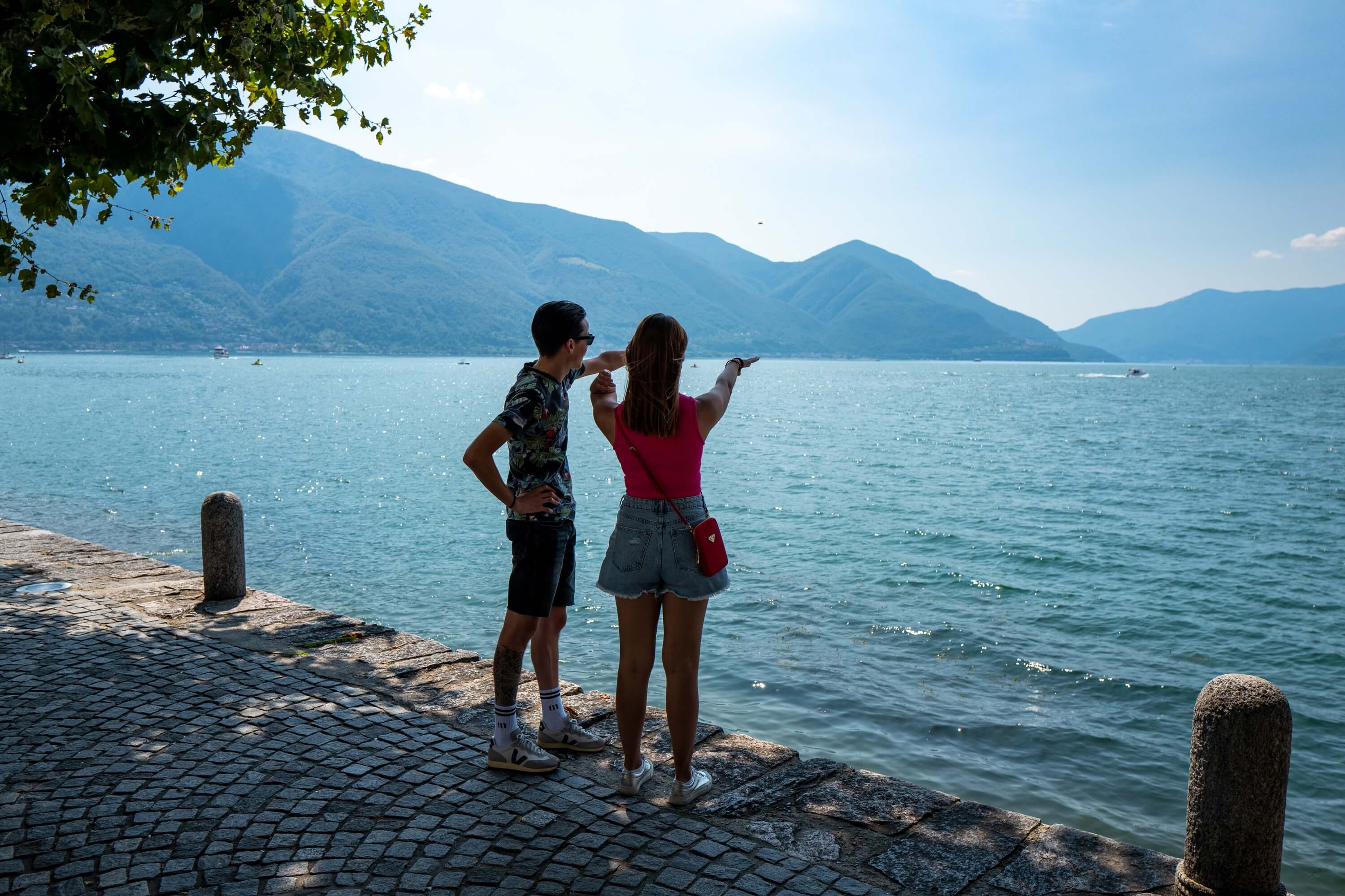 A couple looking out across the lake