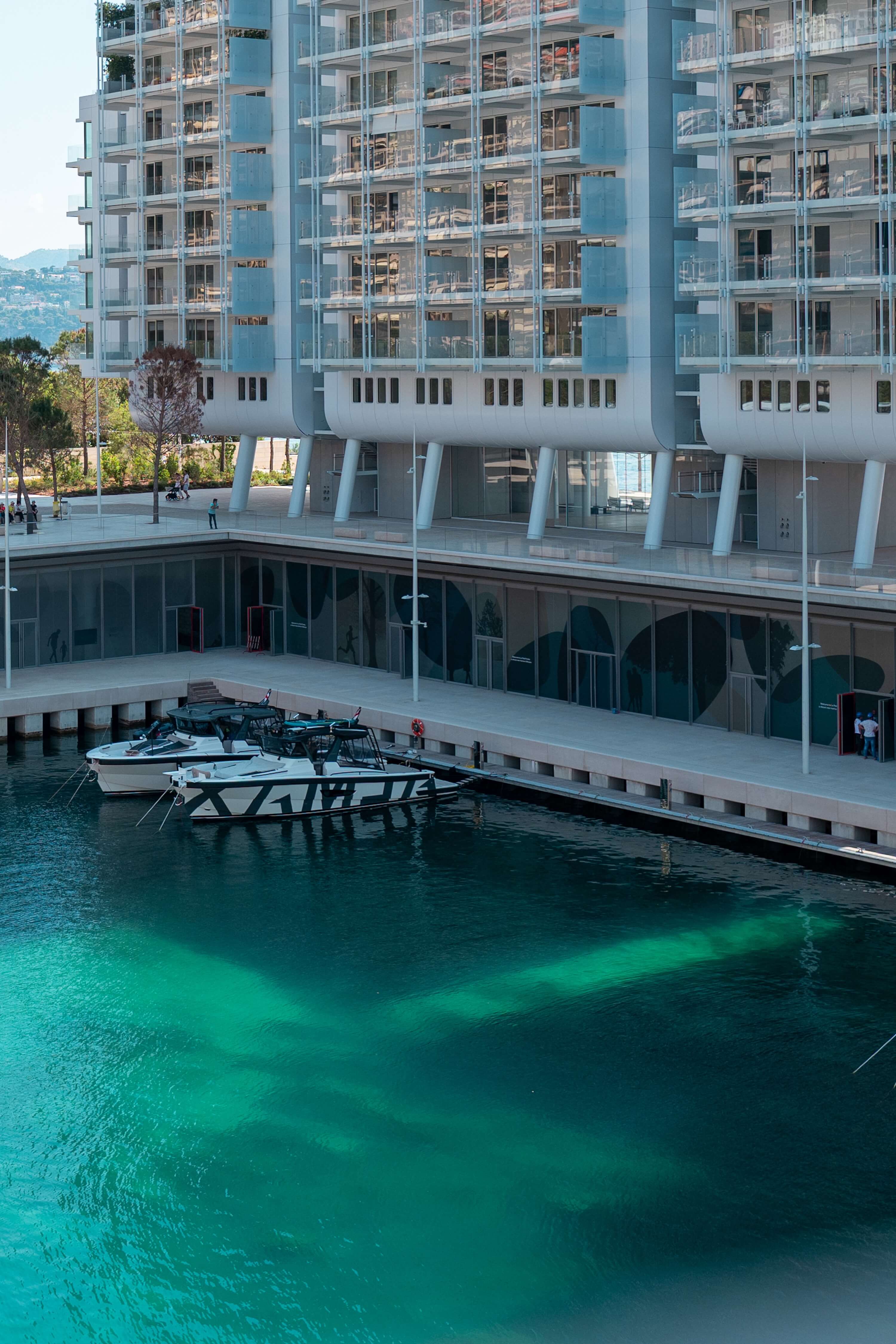 Seafront residences with a port