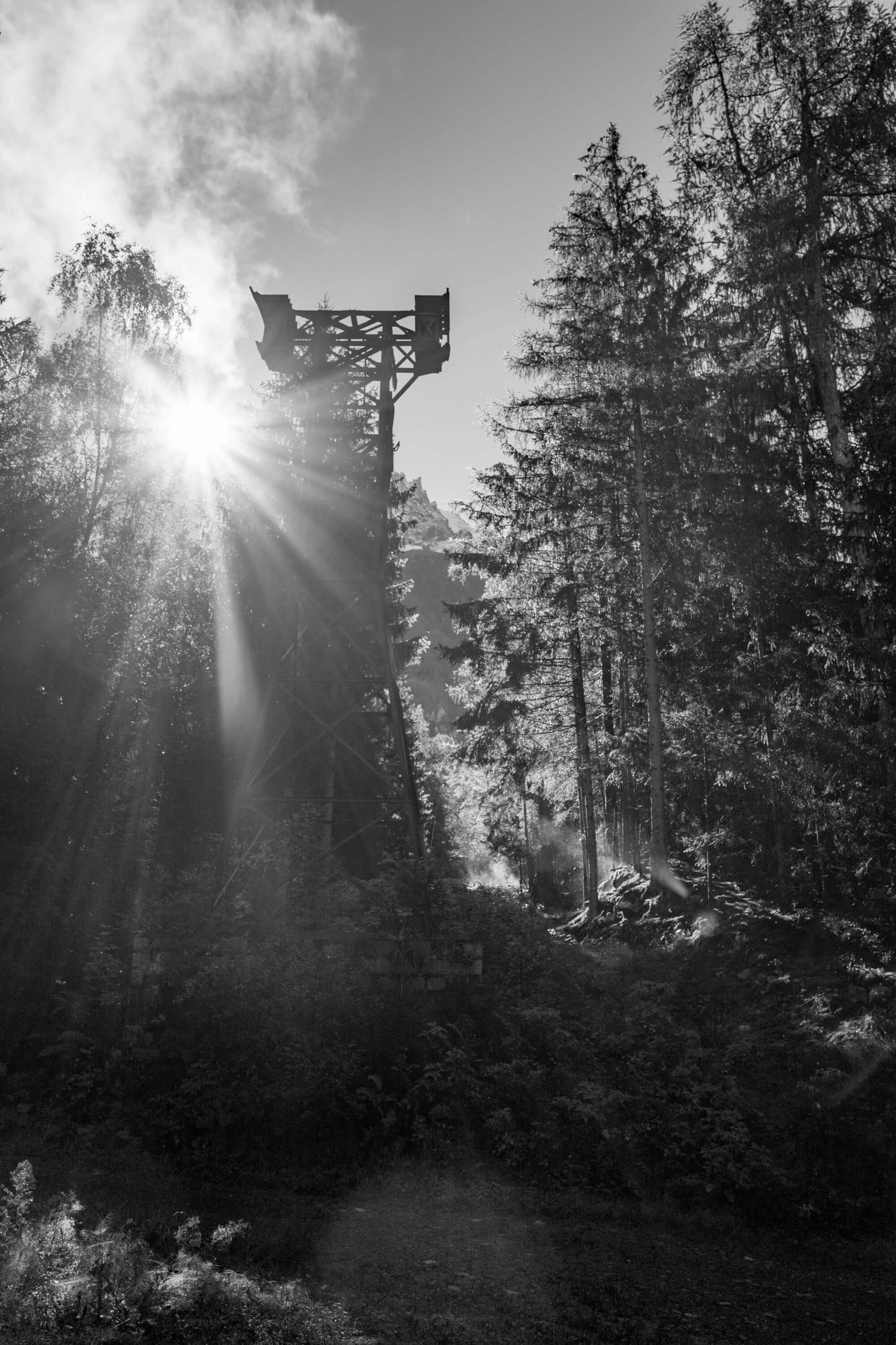 An abandoned pylon for a ski lift in the forest
