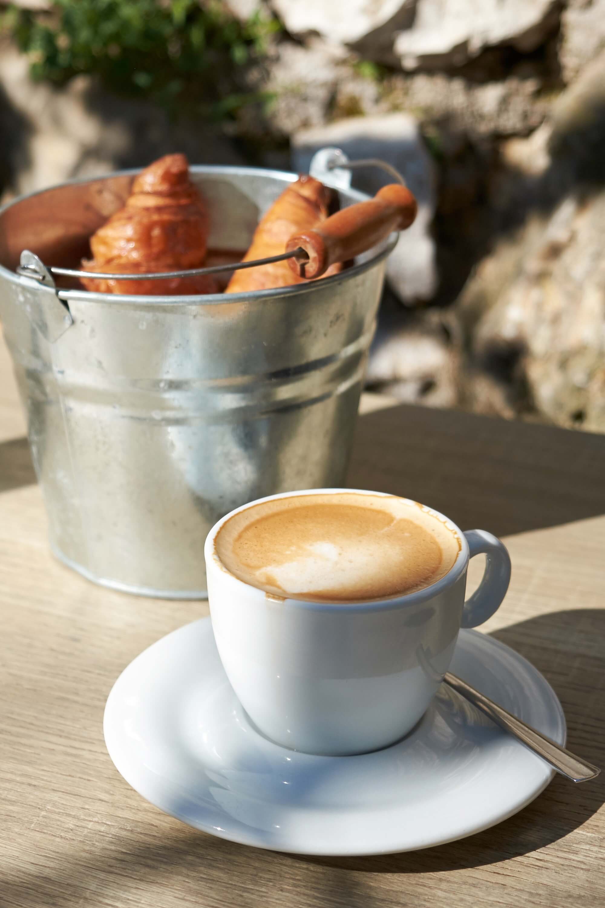 If you time it right, coffee and croissants at one of the secluded cafés are available to revive you