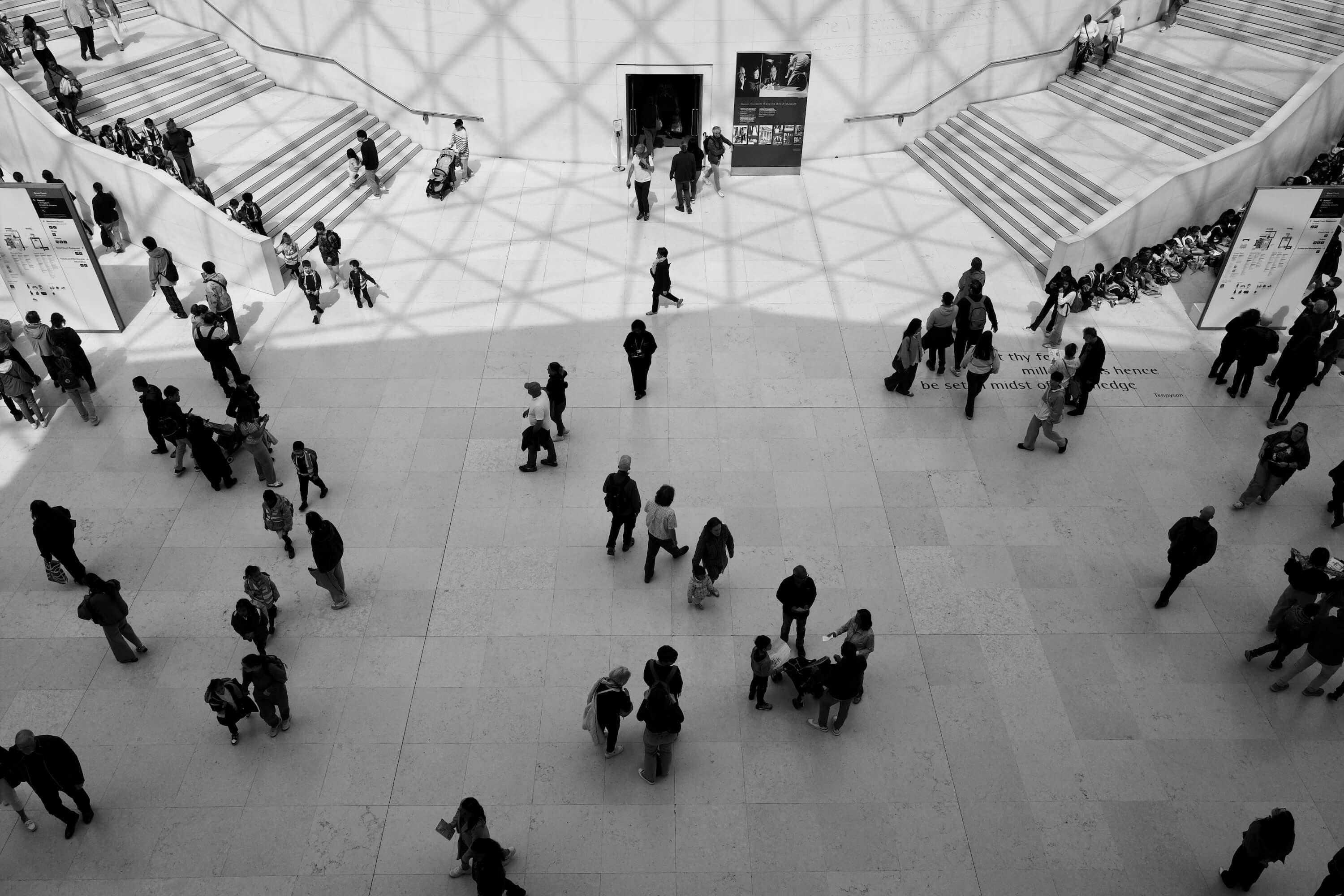 Visitors crossing the Great Court floor